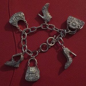Silver tone charm bracelets